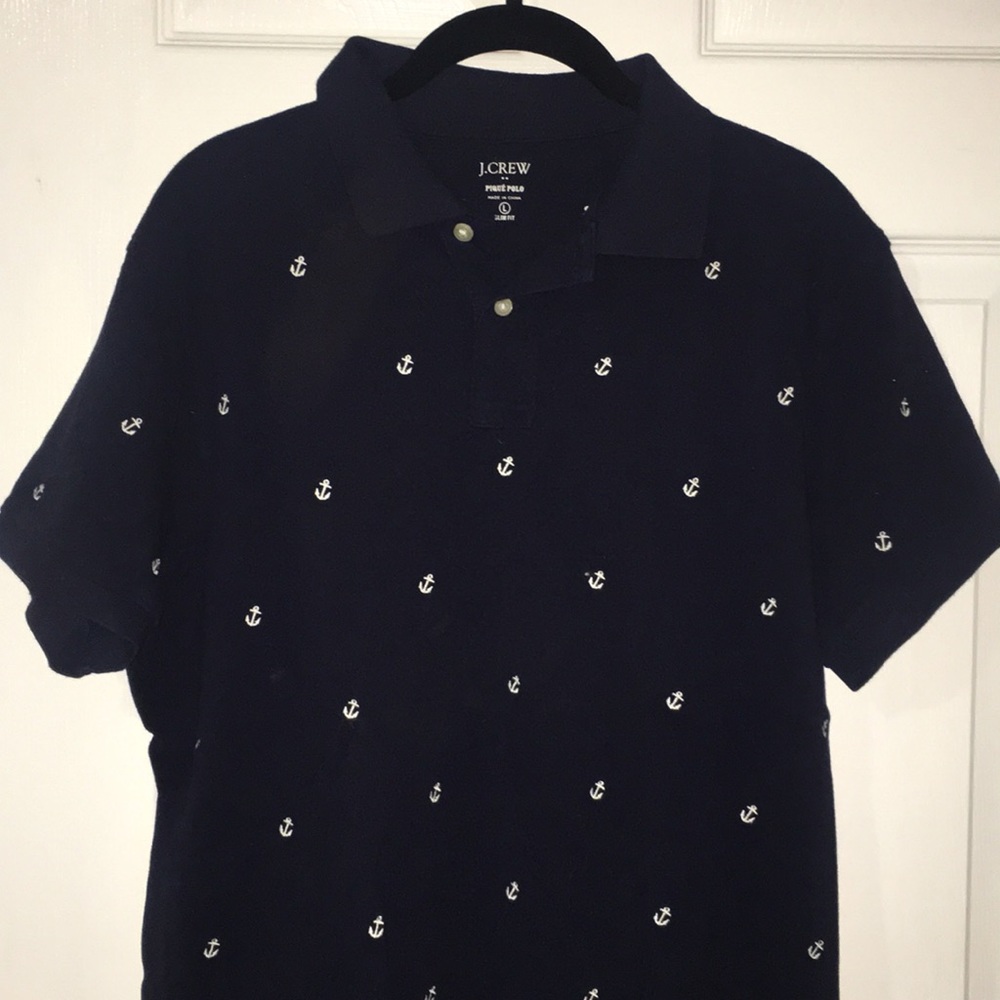 J. Crew men’s navy polo with embroidered anchors.
